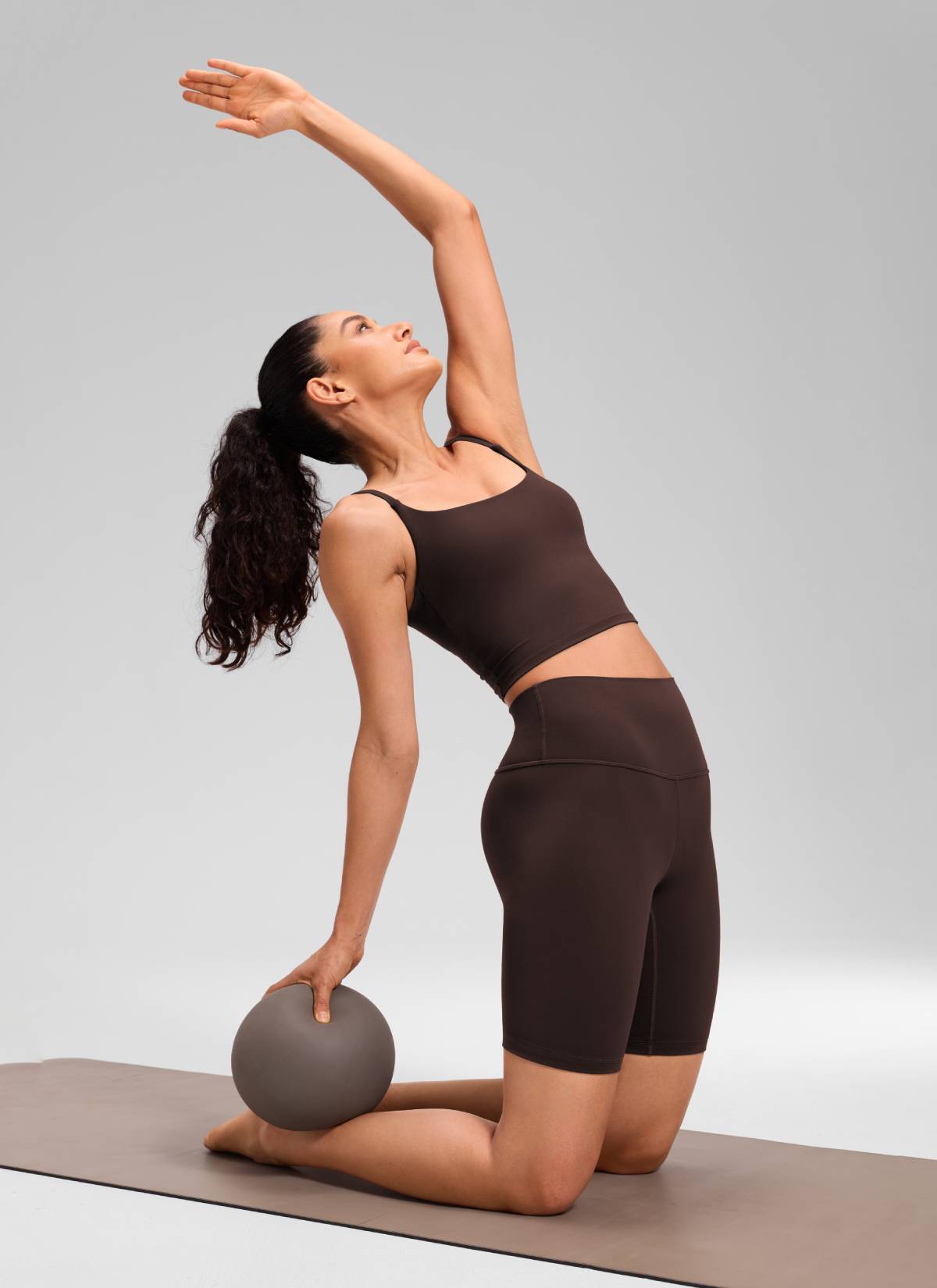 CRZ YOGA Women's Yoga High Rise Butterluxe Long Biker Shorts 8'' Hot Fudge Brown @model_info:Larissa