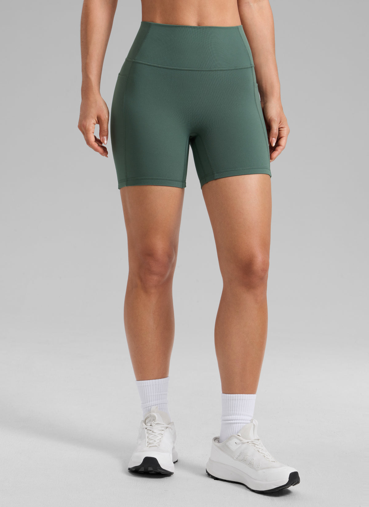 CRZ YOGA Butterlift Womens Scrunch Butt No Front Seam Pocket Biker Shorts 5'' Dark Forest Green @model_info:A