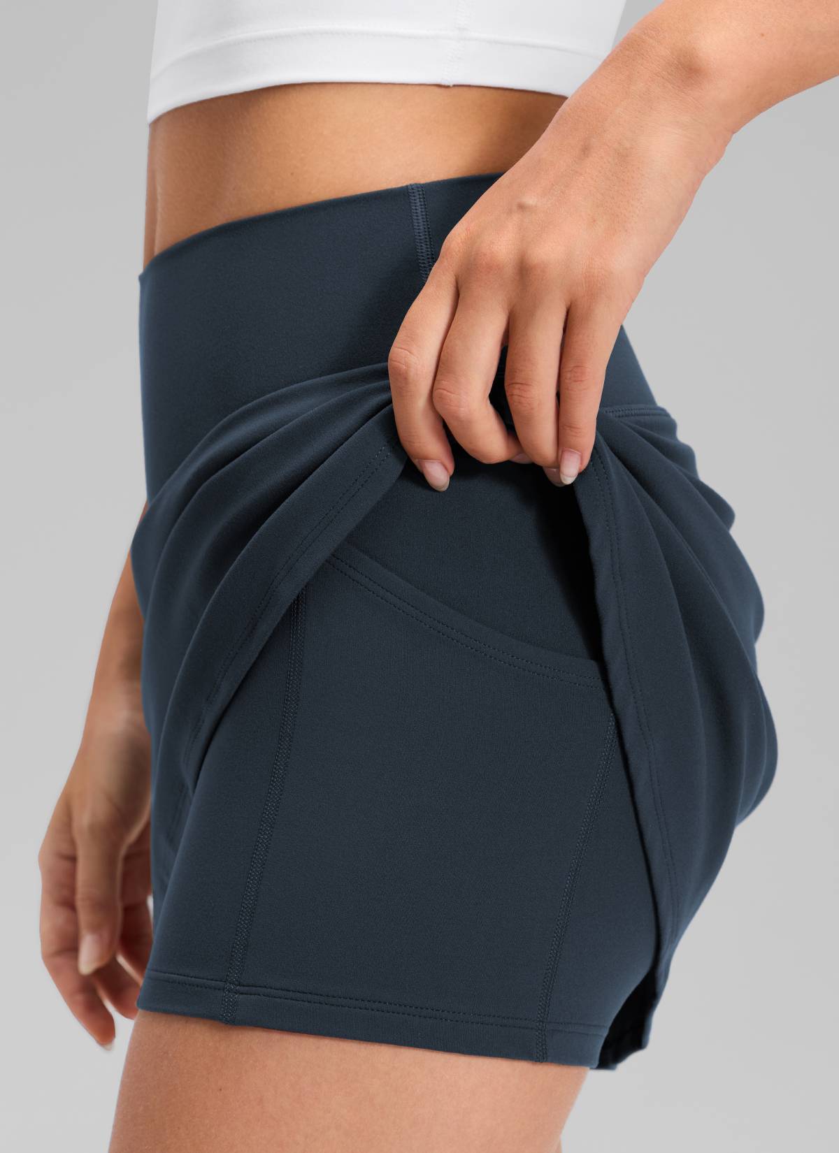CRZ YOGA Women's Butterluxe High Rise Tennis Skirts 14.5'' with Pocket True Navy @model_info:Anna